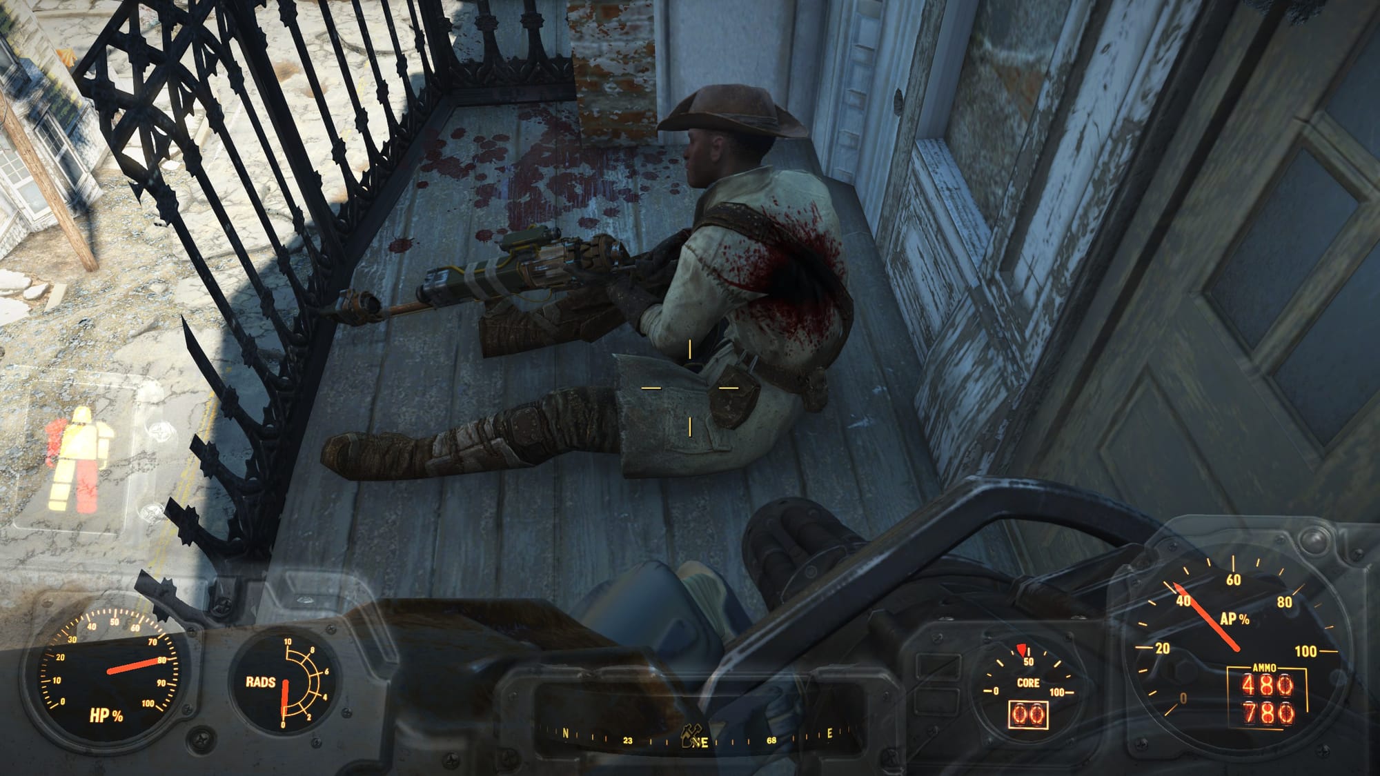 The player character from Fallout 4 standing over an injured Preston Garvey. The player is wearing a power suit and has just shot Preston.