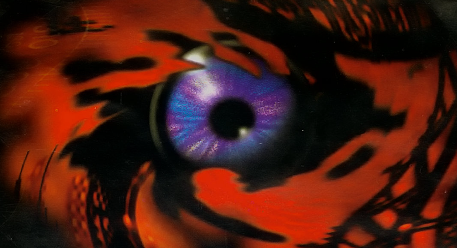 Cover image for the game DreamWeb, which depicts an eye trapped in a red vortex.